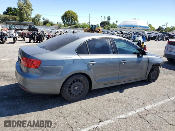 2014 Volkswagen Jetta SE with VIN 3VWD17AJ2EM322087, listed as a Copart auction lot 62571155 with 71,884 mi miles and Salvage title. Bid and sale history available at DreamBid. Image 3.