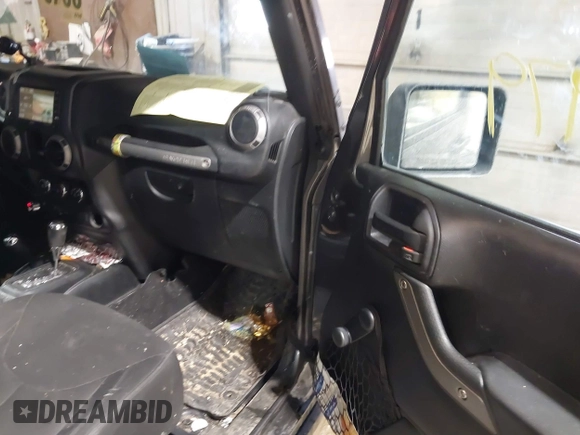 2016 Jeep Wrangler Unlimited Sport with VIN 1C4BJWDG2GL210060, listed as a IAAI auction lot 41546979 with 13,542 mi miles and . Bid and sale history available at DreamBid. Image 5.