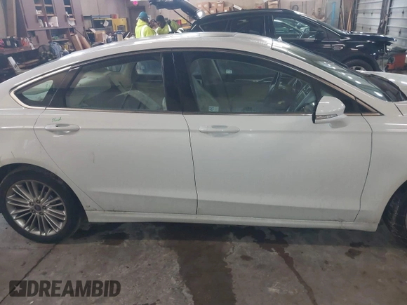 2016 Ford Fusion SE with VIN 3FA6P0T94GR268243, listed as a IAAI auction lot 41690685 with 63,327 mi miles. Bid and sale history available at carsss.com. Image 13.