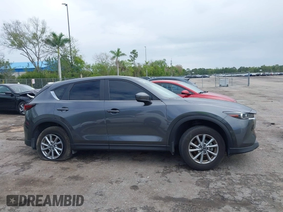 2023 Mazda CX-5 2.5 S Select Package with VIN JM3KFBBM3P0289296, listed as a IAAI auction lot 41676427 with 15,709 mi miles. Bid and sale history available at carsss.com. Image 13.