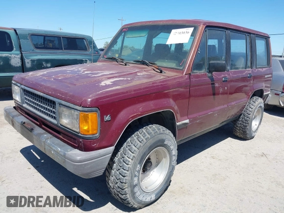 1991 Isuzu Trooper z VIN JACCH58R8M7904079, wystawiony jako IAAI lot #42303036 z przebiegiem 244 672 mil mil oraz . Historia ofert i sprzedaży dostępna na DreamBid. Obrazek 2.