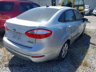 2016 Ford Fiesta SE with VIN 3FADP4BJ0GM121019, listed as a IAAI auction lot 41727967 with 87,725 mi miles and . Bid and sale history available at DreamBid. Image 4.