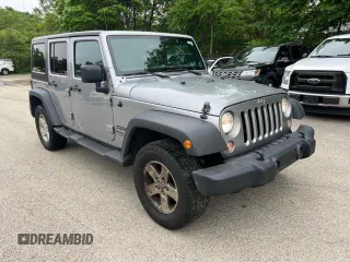 2018 Jeep Wrangler Unlimited Sport S with VIN 1C4HJWDG6JL927319, listed as a Copart auction lot 60488085 with 185,000 mi miles and Clean title. Bid and sale history available at DreamBid. Image 1.