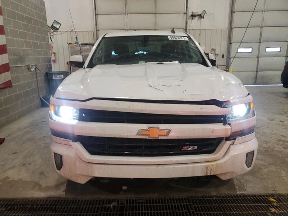 2018 Chevrolet Silverado 1500 LT with VIN 1GCVKRECXJZ159953, listed as a Copart auction lot 88528365 with 105,152 mi miles and Salvage Title. Bid and sale history available at carsss.com. Image 5.