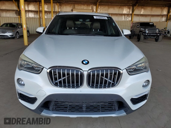 2016 BMW X1 xDrive28i z VIN WBXHT3C35GP881610, wystawiony jako Copart lot #57690625 z przebiegiem 189 579 mil mil oraz Czysty tytuł • Clean title. Historia ofert i sprzedaży dostępna na DreamBid. Obrazek 5.