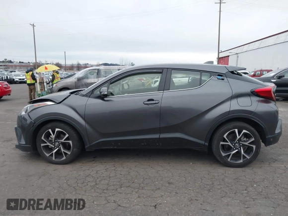 2019 Toyota C-HR XLE with VIN JTNKHMBX5K1035676, listed as a IAAI auction lot 41161562 with 185,962 mi miles. Bid and sale history available at carsss.com. Image 14.
