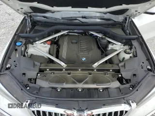 2021 BMW X5 xDrive40i z VIN 5UXCR6C07M9H21128, wystawiony jako Copart lot #54084915 z przebiegiem 26 966 mil mil oraz Szkody całkowita. Historia ofert i sprzedaży dostępna na DreamBid. Obrazek 12.