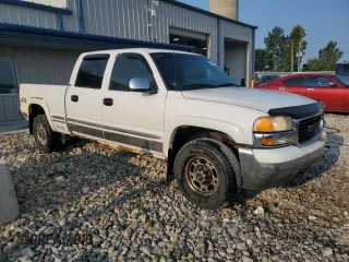 2002 GMC Sierra 1500HD SLE z VIN 1GTGK13U22F137583, wystawiony jako Copart lot #65997484 z przebiegiem 399 610 mil mil oraz Tytuł czysty. Historia ofert i sprzedaży dostępna na DreamBid. Obrazek 4.