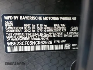 2022 BMW iX xDrive50 with VIN WB523CF05NCK62929, listed as a Copart auction lot 83295544 with 24,299 mi miles and Salvage Title. Bid and sale history available at carsss.com. Image 13.