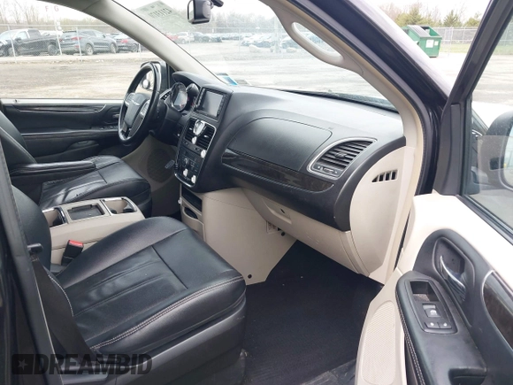 2014 Chrysler Town & Country Touring with VIN 2C4RC1BG7ER449297, listed as a IAAI auction lot 42113170 with 195,878 mi miles and . Bid and sale history available at DreamBid. Image 5.