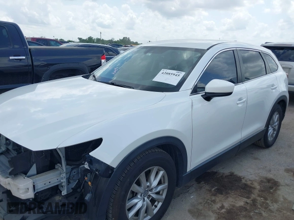 2016 Mazda CX-9 Sport z VIN JM3TCABY1G0111316, wystawiony jako IAAI lot #42085945 z przebiegiem 98 691 mil mil oraz . Historia ofert i sprzedaży dostępna na DreamBid. Obrazek 18.