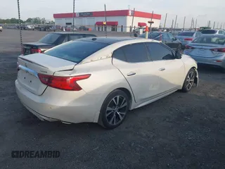2017 Nissan Maxima S with VIN 1N4AA6AP2HC367322, listed as a IAAI auction lot 42012073 with 116,497 mi miles and . Bid and sale history available at DreamBid. Image 4.