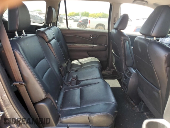 2016 Honda Pilot EX-L z VIN 5FNYF6H53GB105289, wystawiony jako Copart lot #52939575 z przebiegiem Nie podano mil oraz Szkoda całkowita • Salvage title. Historia ofert i sprzedaży dostępna na DreamBid. Obrazek 11.