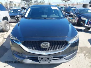 2019 Mazda CX-5 Sport with VIN JM3KFABM7K1579747, listed as a IAAI auction lot 41965097 with 151,042 mi miles and . Bid and sale history available at DreamBid. Image 13.