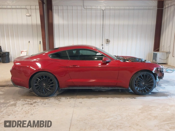 2017 Ford Mustang V6 z VIN 1FA6P8AMXH5309985, wystawiony jako IAAI lot #41501211 z przebiegiem 63 885 mil mil oraz . Historia ofert i sprzedaży dostępna na DreamBid. Obrazek 14.