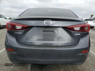 2016 Mazda 3 i Touring z VIN JM1BM1V7XG1311352, wystawiony jako Copart lot #56194805 z przebiegiem 115 321 mil mil oraz Szkoda całkowita • Salvage title. Historia ofert i sprzedaży dostępna na DreamBid. Obrazek 6.