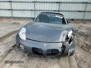 2009 Pontiac Solstice z VIN 1G2MN35B69Y105093, wystawiony jako Copart lot #72854034 z przebiegiem 82 333 mil mil oraz Szkoda całkowita • Salvage title. Historia ofert i sprzedaży dostępna na DreamBid. Obrazek 10.