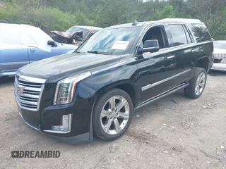 2016 Cadillac Escalade Platinum z VIN 1GYS3DKJ7GR374845, wystawiony jako IAAI lot #41951693 z przebiegiem 93 820 mil mil oraz . Historia ofert i sprzedaży dostępna na DreamBid. Obrazek 2.