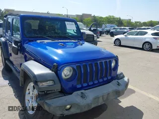 2018 Jeep Wrangler Unlimited Sport S z VIN 1C4HJXDG7JW299534, wystawiony jako IAAI lot #42321004 z przebiegiem 110 206 mil mil oraz . Historia ofert i sprzedaży dostępna na DreamBid. Obrazek 13.