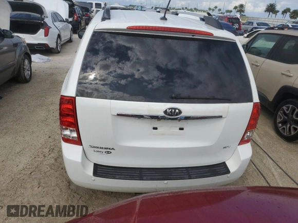 2014 Kia Sedona EX with VIN KNDMH4C70E6568487, listed as a Copart auction lot 74682134 with 69,977 mi miles and Salvage Title. Bid and sale history available at carsss.com. Image 6.