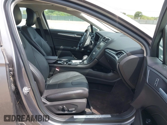 2014 Ford Fusion Titanium with VIN 3FA6P0SU0ER269411, listed as a IAAI auction lot 42163704 with 169,355 mi miles and . Bid and sale history available at DreamBid. Image 5.