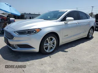 2018 Ford Fusion SE z VIN 3FA6P0LU8JR110693, wystawiony jako Copart lot #61931995 z przebiegiem 119 629 mil mil oraz Szkoda całkowita • Salvage title. Historia ofert i sprzedaży dostępna na DreamBid. Obrazek 1.