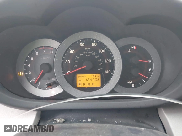 2006 Toyota RAV4 with VIN JTMBD33VX65015543, listed as a IAAI auction lot 41986857 with 124,709 mi miles. Bid and sale history available at carsss.com. Image 7.