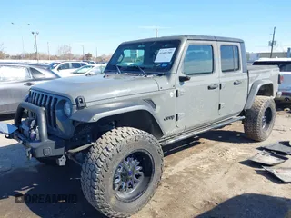 2020 Jeep Gladiator Sport S with VIN 1C6JJTAG6LL190749, listed as a IAAI auction lot 41401209 with 97,292 mi miles and . Bid and sale history available at DreamBid. Image 2.