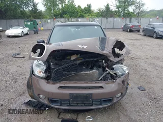 2014 MINI Countryman S with VIN WMWZC5C55EWP41717, listed as a IAAI auction lot 42324347 with Not provided miles and . Bid and sale history available at DreamBid. Image 6.