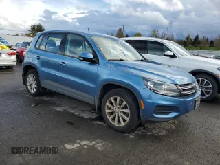 2017 Volkswagen Tiguan S with VIN WVGBV7AX1HK052098, listed as a Copart auction lot 51115295 with 53,906 mi miles and Salvage Title. Bid and sale history available at DreamBid. Image 4.
