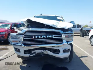 2023 Ram 2500 Laramie with VIN 3C6UR5FL2PG559276, listed as a IAAI auction lot 42281324 with 23,526 mi miles and . Bid and sale history available at DreamBid. Image 6.