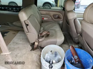 1999 GMC Denali z VIN 1GKEK13R1XR917376, wystawiony jako Copart lot #64991924 z przebiegiem 247 231 mil mil oraz Tytuł czysty. Historia ofert i sprzedaży dostępna na DreamBid. Obrazek 10.