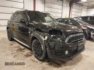 2019 MINI Countryman Cooper S z VIN WMZYT5C59K3G91029, wystawiony jako IAAI lot #42039745 z przebiegiem 128 365 mil mil oraz . Historia ofert i sprzedaży dostępna na DreamBid. Obrazek 1.
