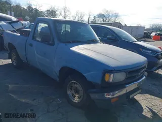 1996 Mazda B-Series 2WD Truck with VIN 4F4CR12A9TTM18551, listed as a IAAI auction lot 41498357 with 209,818 mi miles. Bid and sale history available at carsss.com. Image 1.