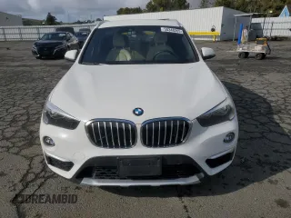 2017 BMW X1 sDrive28i with VIN WBXHU7C33H5H32827, listed as a Copart auction lot 50348265 with 117,412 mi miles and Salvage Title. Bid and sale history available at carsss.com. Image 5.
