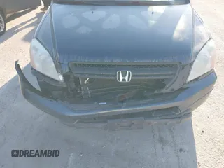 2005 Honda Pilot EX-L with VIN 5FNYF18505B036545, listed as a IAAI auction lot 41633967 with 184,038 mi miles. Bid and sale history available at carsss.com. Image 6.