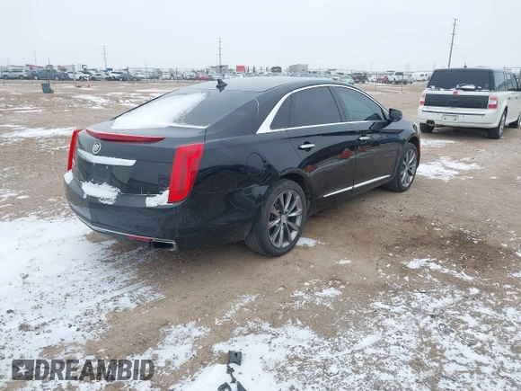 2013 Cadillac XTS Luxury with VIN 2G61R5S30D9100094, listed as a IAAI auction lot 41601711 with 191,068 mi miles and . Bid and sale history available at DreamBid. Image 4.