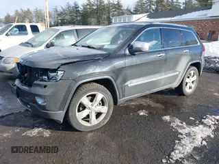 2013 Jeep Grand Cherokee Overland with VIN 1C4RJFCT3DC636378, listed as a IAAI auction lot 41477415 with 147,651 mi miles. Bid and sale history available at carsss.com. Image 17.