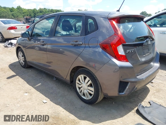 2015 Honda Fit LX with VIN 3HGGK5G57FM747786, listed as a IAAI auction lot 42656703 with 102,637 mi miles and . Bid and sale history available at DreamBid. Image 3.