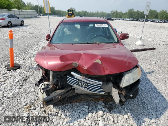 2009 Kia Optima LX z VIN KNAGE228795334599, wystawiony jako Copart lot #59276515 z przebiegiem 180 399 mil mil oraz Szkoda całkowita • Salvage title. Historia ofert i sprzedaży dostępna na DreamBid. Obrazek 5.