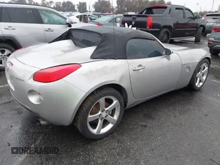 2006 Pontiac Solstice with VIN 1G2MB33B46Y106332, listed as a IAAI auction lot 41561521 with 165,224 mi miles. Bid and sale history available at carsss.com. Image 4.