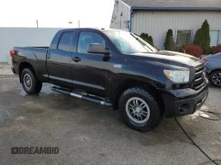 2011 Toyota Tundra 4WD Truck with VIN 5TFUW5F10BX175419, listed as a Copart auction lot 52949645 with 200,986 mi miles and Salvage Title. Bid and sale history available at carsss.com. Image 4.