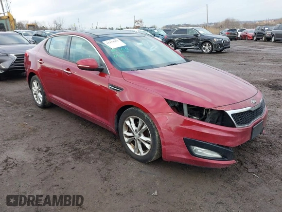 2013 Kia Optima EX z VIN 5XXGN4A78DG141924, wystawiony jako IAAI lot #41474952 z przebiegiem 172 814 mil mil oraz . Historia ofert i sprzedaży dostępna na DreamBid. Obrazek 1.