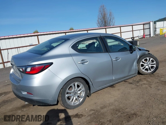 2018 Toyota Yaris with VIN 3MYDLBYV8JY328229, listed as a IAAI auction lot 41949610 with 54,651 mi miles and . Bid and sale history available at DreamBid. Image 4.