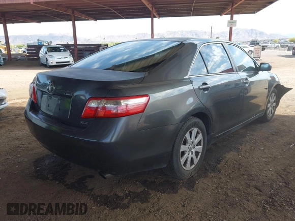 2007 Toyota Camry CE with VIN 4T1BE46KX7U008924, listed as a IAAI auction lot 42171072 with 254,303 mi miles and . Bid and sale history available at DreamBid. Image 4.