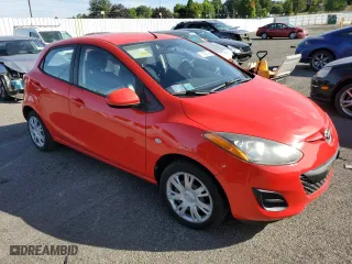 2011 Mazda Mazda2 Sport with VIN JM1DE1HY0B0108639, listed as a Copart auction lot 71036144 with 73,999 mi miles and Salvage Title. Bid and sale history available at carsss.com. Image 4.