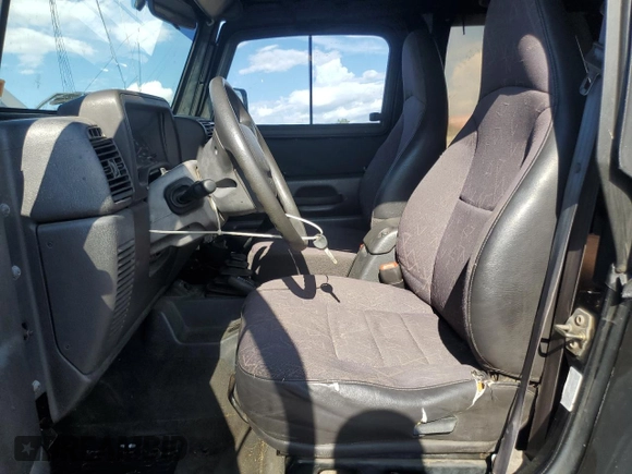 2002 Jeep Wrangler X with VIN 1J4FA39S12P732459, listed as a Copart auction lot 68877244 with 167,368 mi miles and Salvage Title. Bid and sale history available at carsss.com. Image 7.