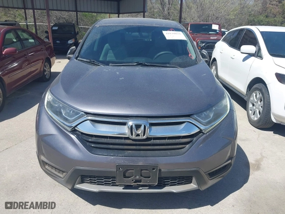 2017 Honda CR-V LX with VIN 7FARW5H33HE014039, listed as a IAAI auction lot 41830031 with 85,730 mi miles. Bid and sale history available at carsss.com. Image 6.