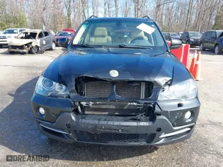 2007 BMW X5 3.0si with VIN 5UXFE43507L011050, listed as a IAAI auction lot 41741678 with 91,758 mi miles. Bid and sale history available at carsss.com. Image 12.