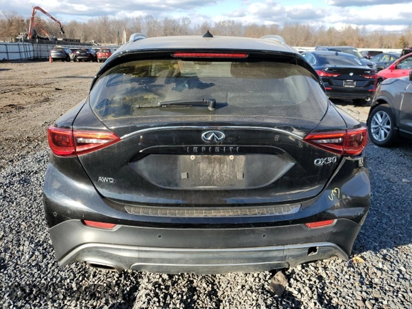 2017 Infiniti QX30 Luxury with VIN SJKCH5CR6HA021094, listed as a Copart auction lot 82018264 with 89,987 mi miles and Salvage title. Bid and sale history available at DreamBid. Image 6.